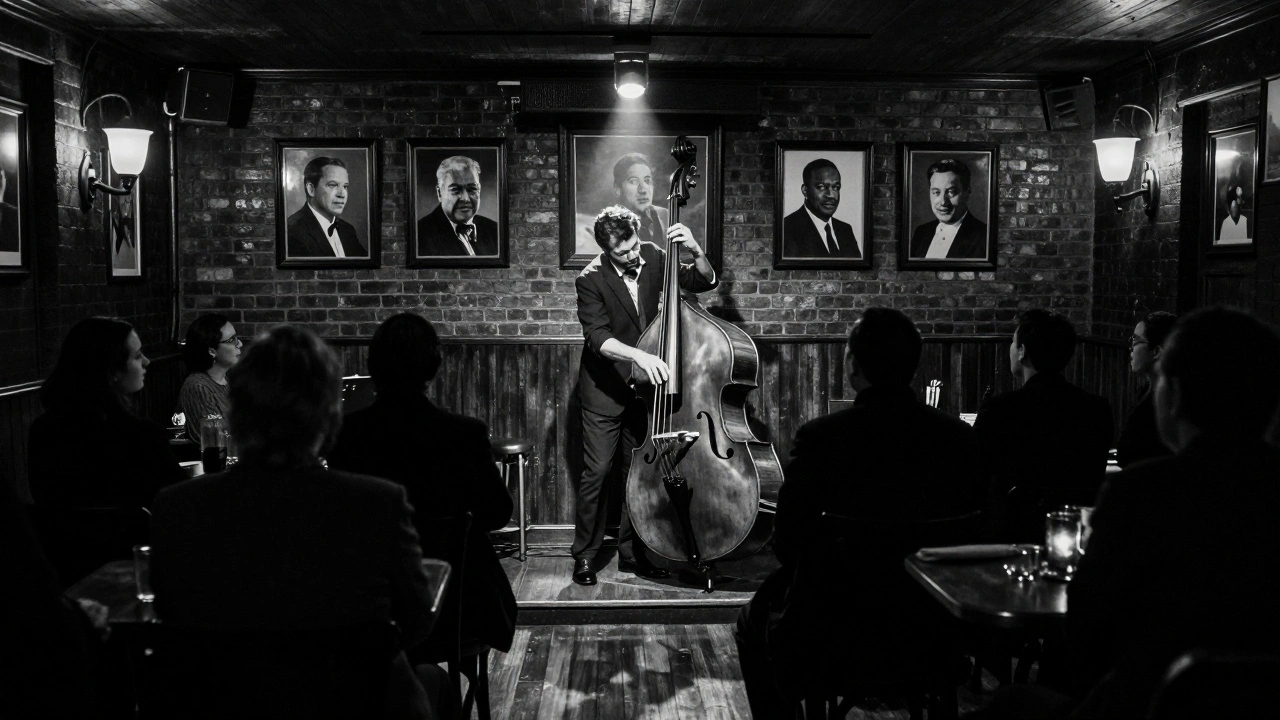 Jazz musician playing double bass on stage under spotlight in dim club